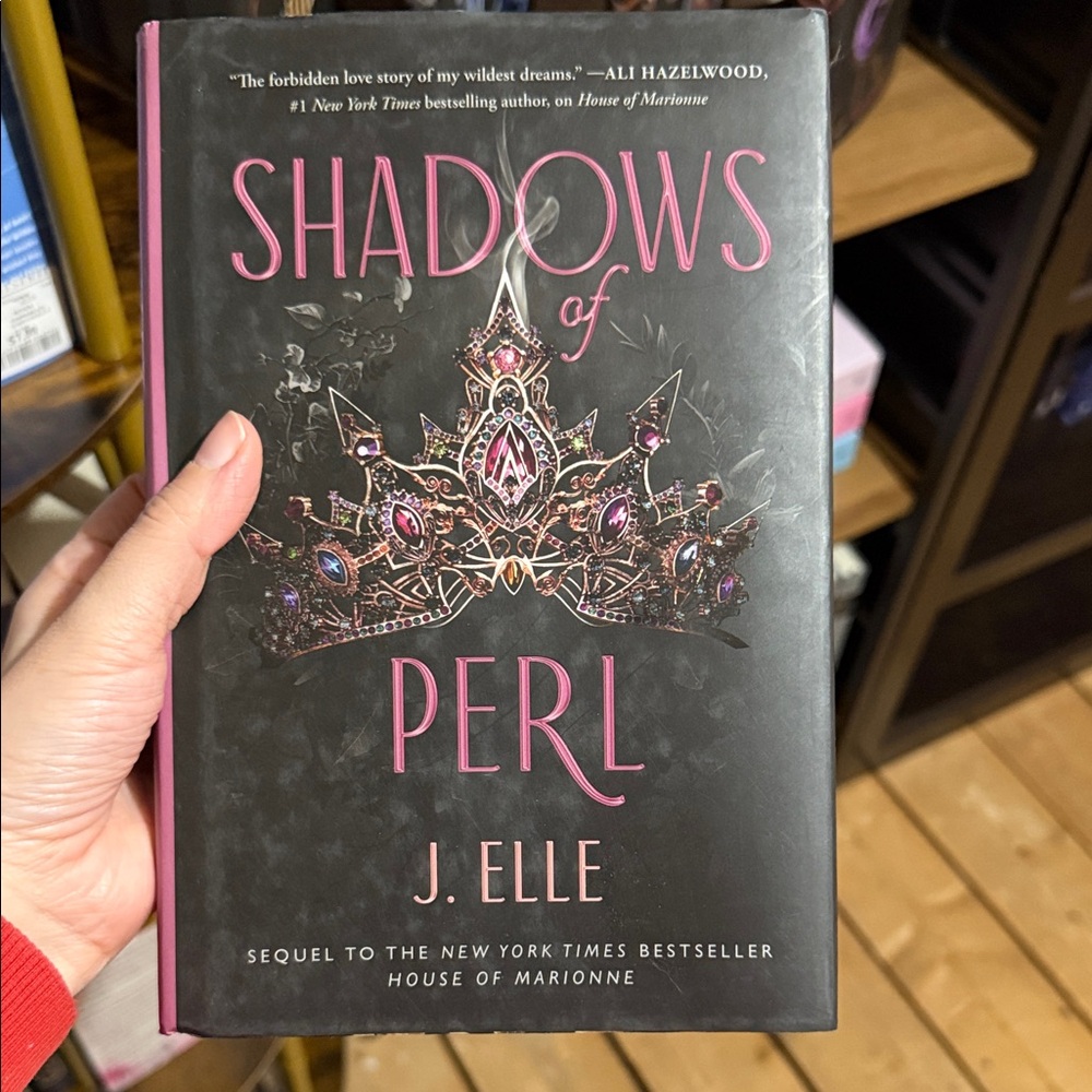 Elle Hardcover Book with Black Cover and Pink Accents